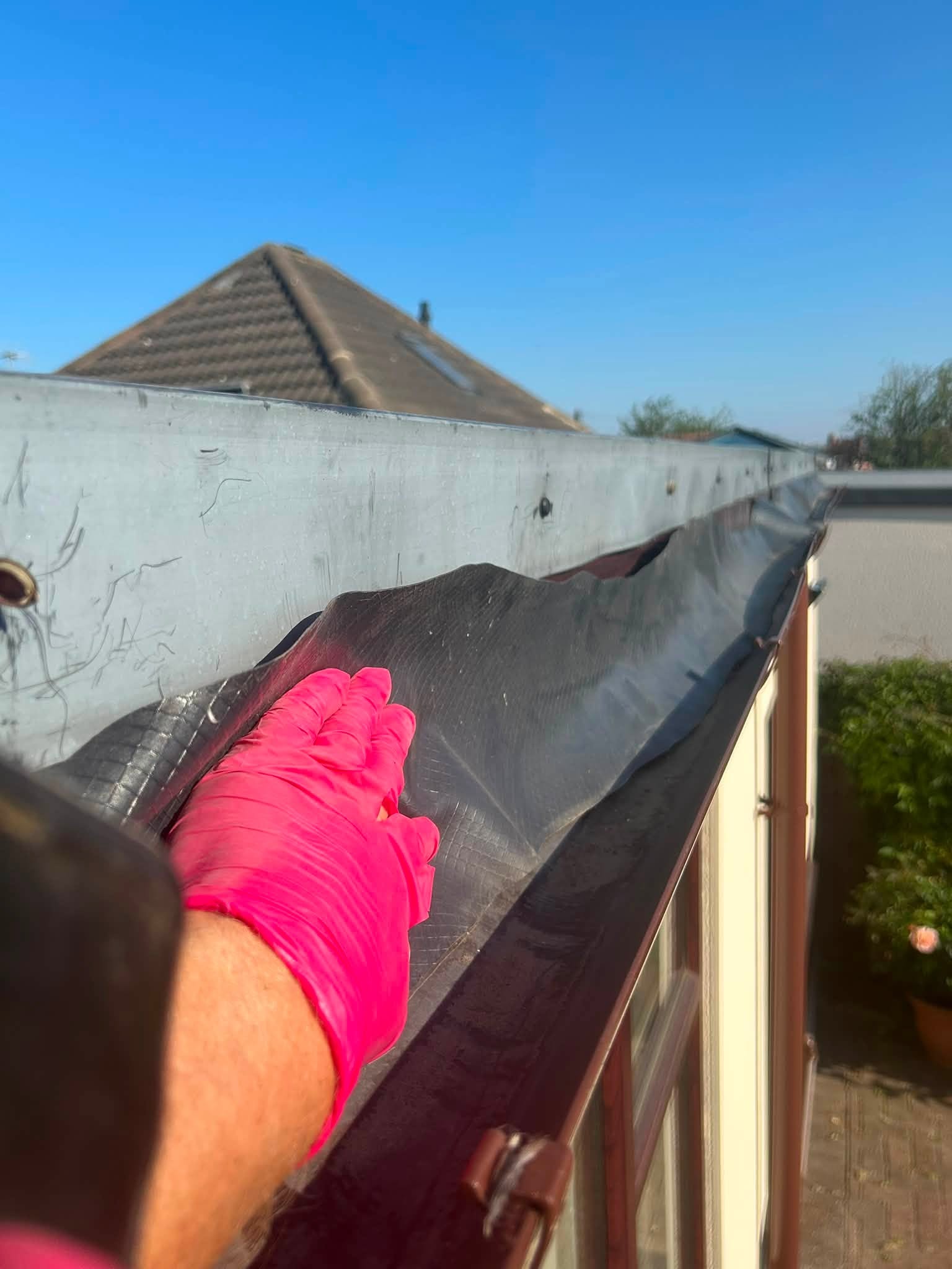 Gutter Cleaning & Repair work by Top Gun & Son