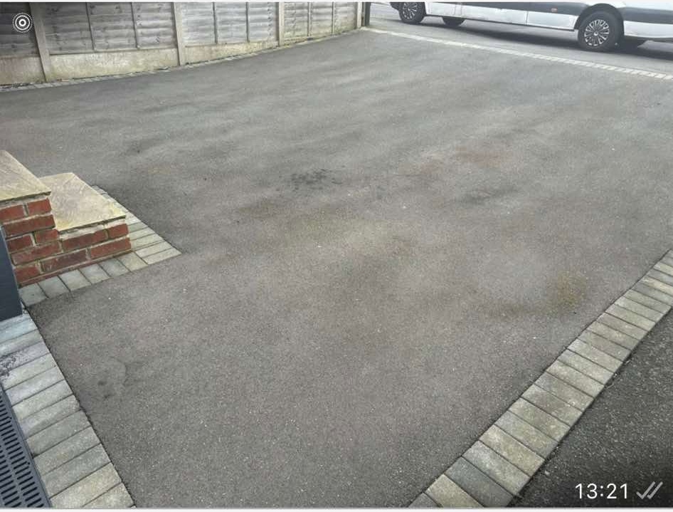 Faded tarmac driveway before restoration by Top Gun & Son